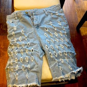 Jean shorts with rips all in them